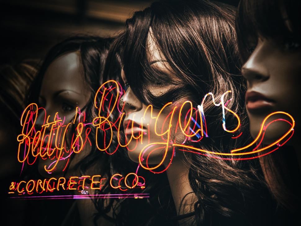 Free Image of Blurred image of hair with neon signs 