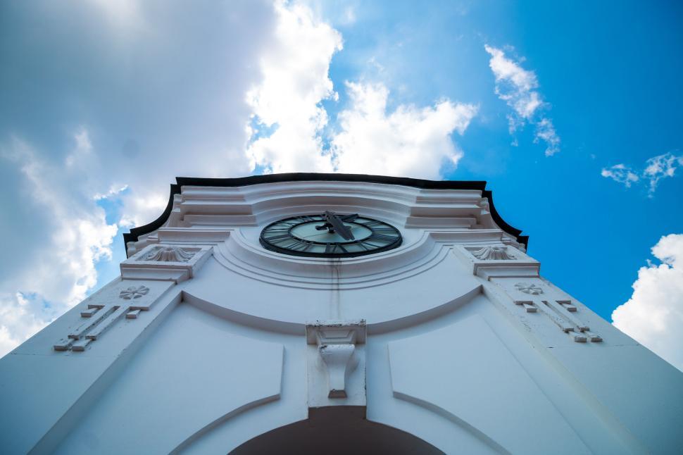 Free Image of Historic white clock tower against sky 
