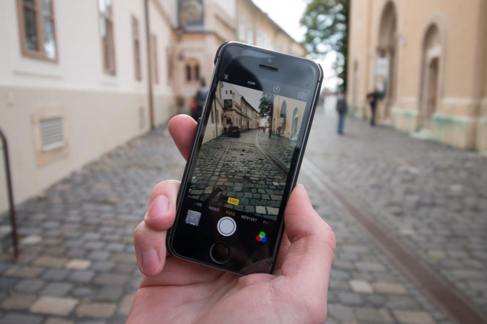 Free Image of iPhone capturing old town street 