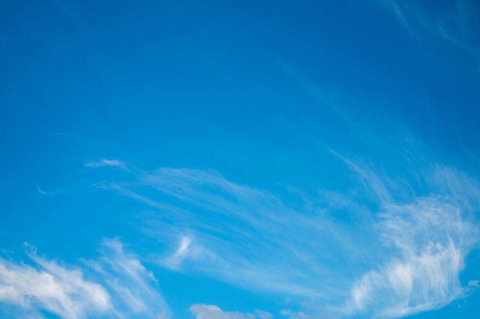 Free Image of Blue sky with soft wispy clouds 