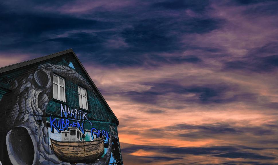 Free Image of Street art on a building at twilight 