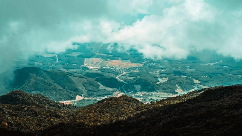 Free Image of Mountainous landscape with mist and clouds 