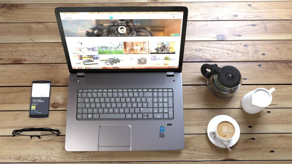 Free Image of Laptop and Accessories on Workspace 