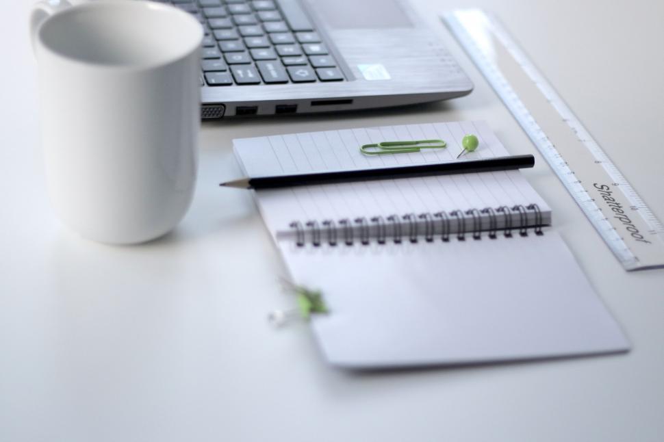 Free Image of Office desk with laptop and stationery items 