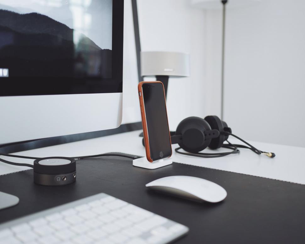 Free Image of Modern workspace with sophisticated tech gadgets 