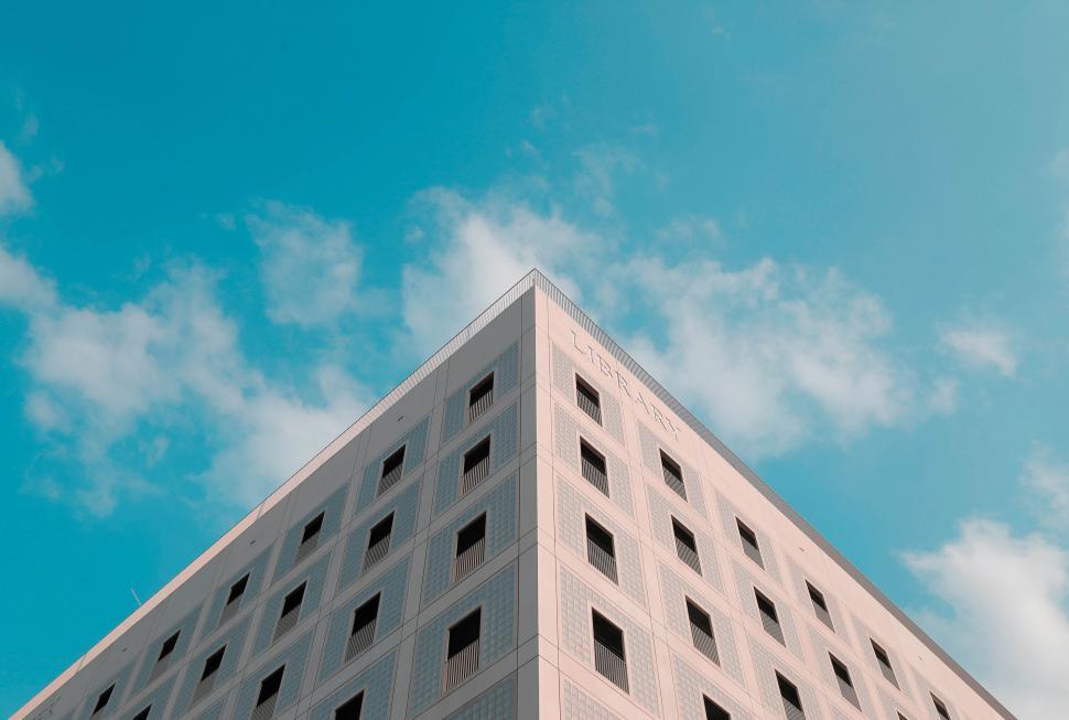 Free Image of Looking up at a modern library building 