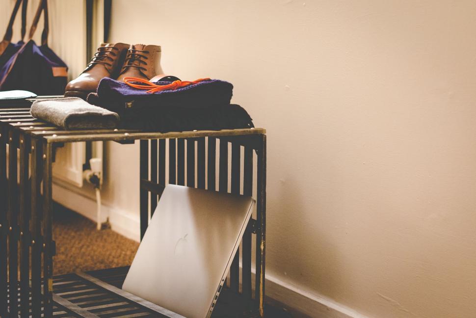 Free Image of Laptop and accessories on side table 