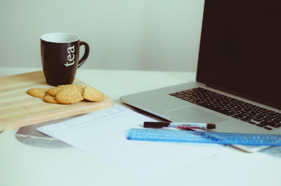 Free Image of Laptop and tea cup on a work desk 