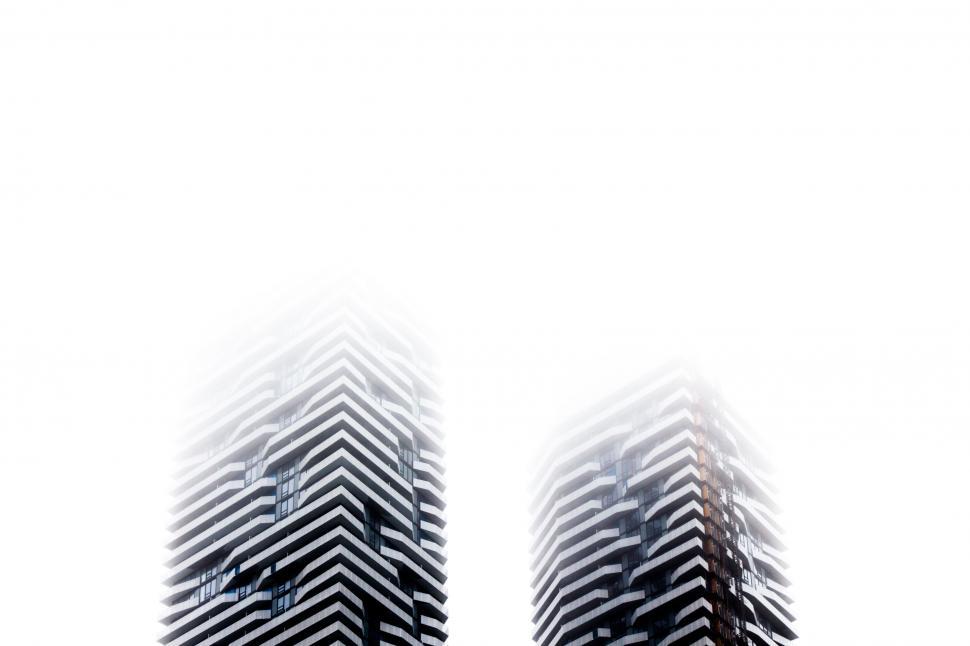 Free Image of Misty effect over symmetrical building tops 