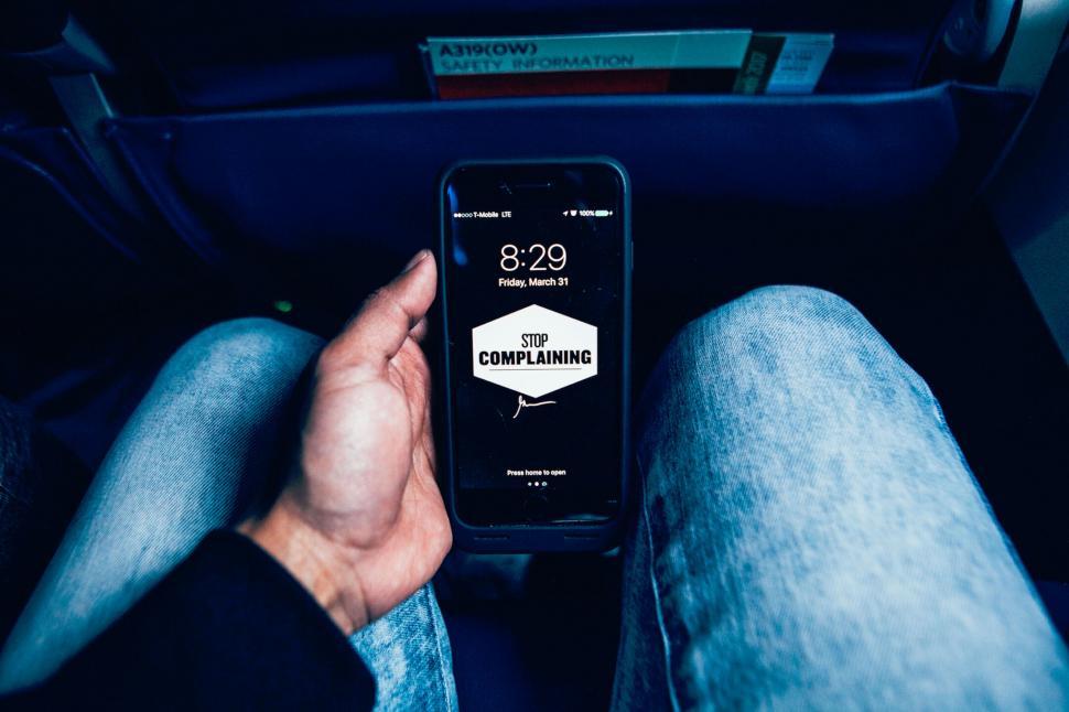 Free Image of Smartphone displaying message in hands 