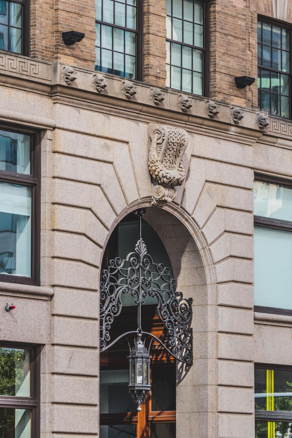Free Image of Arch entryway with decorative lantern 