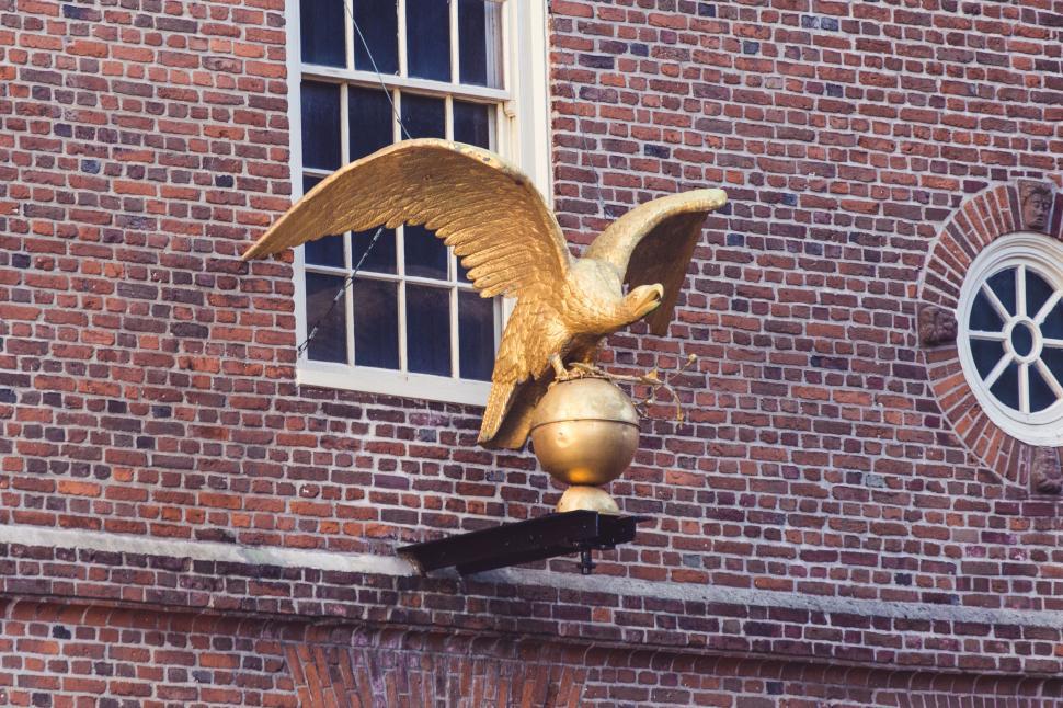 Free Image of Golden eagle statue on historic building 