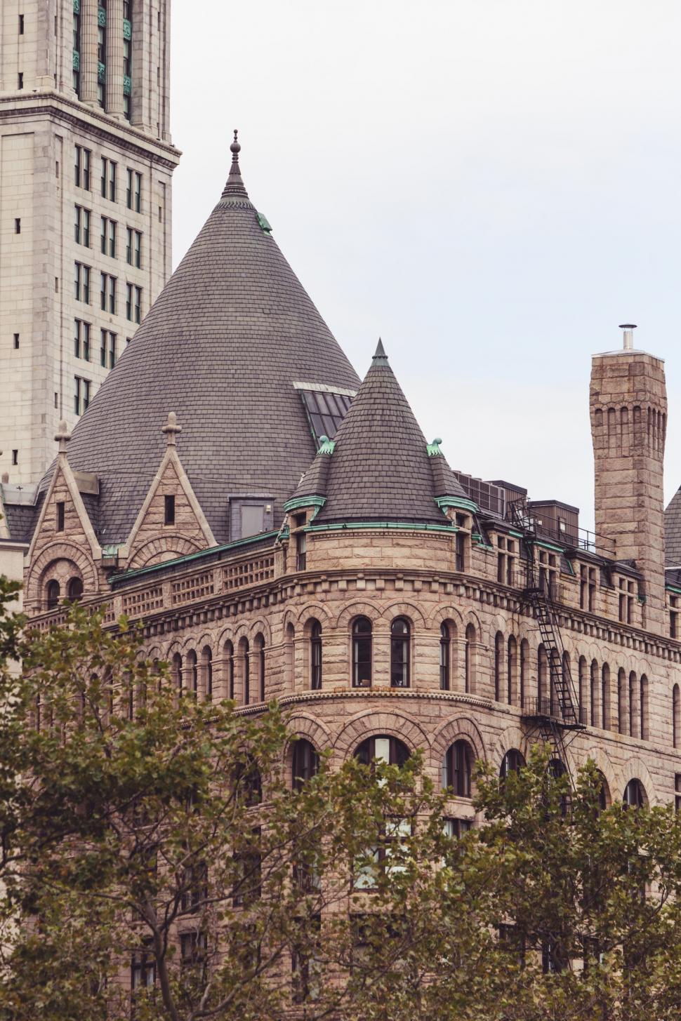 Free Image of Turrets of a vintage stone building with sky 