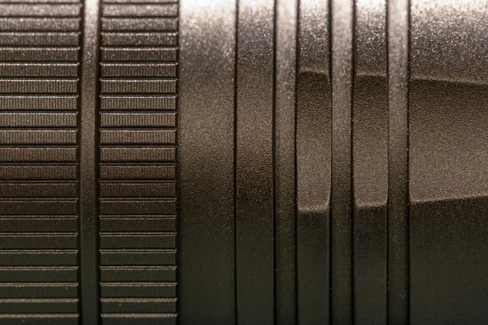 Free Image of Macro texture shot of black camera body 