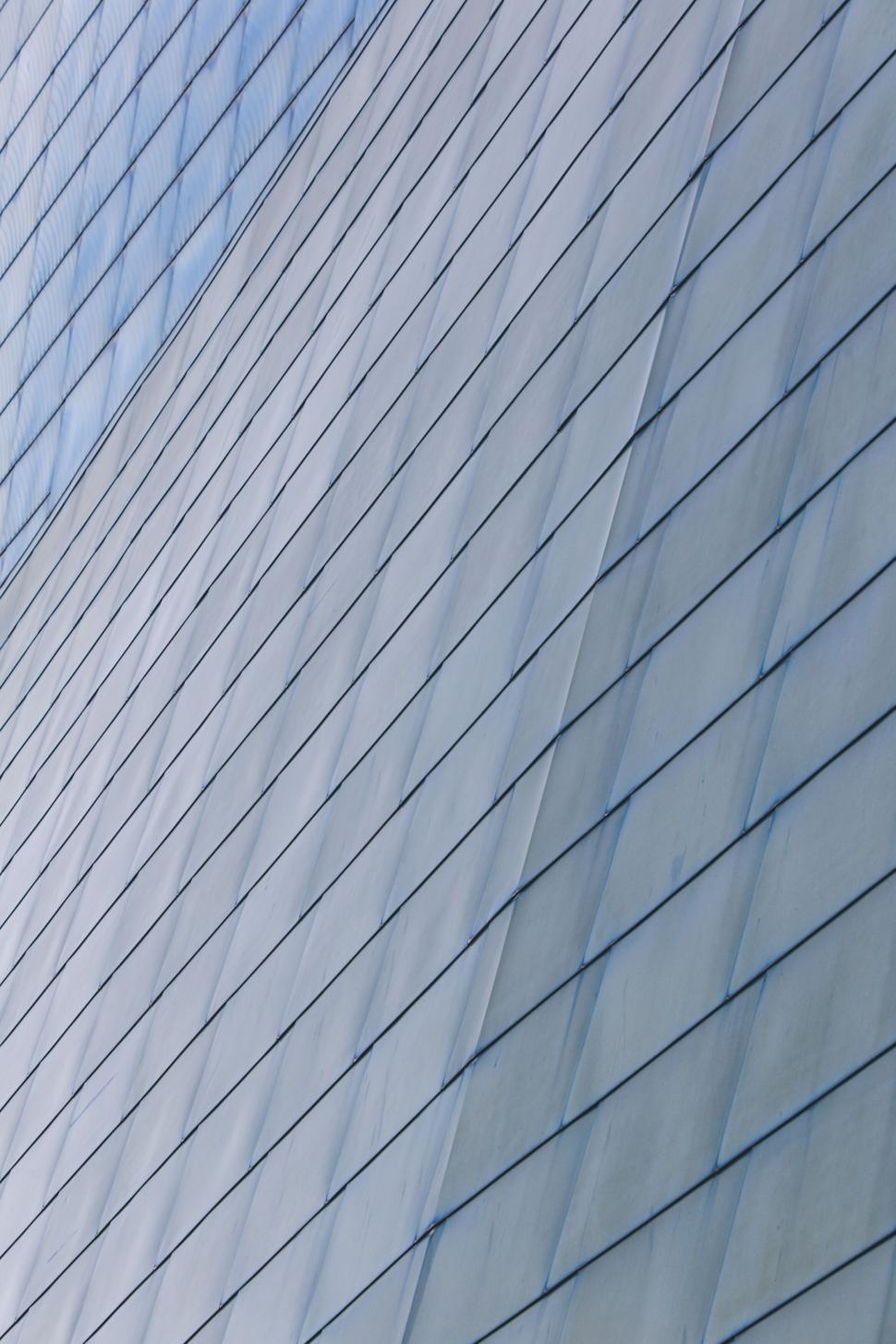 Free Image of Close-up of a curved glass building facade 