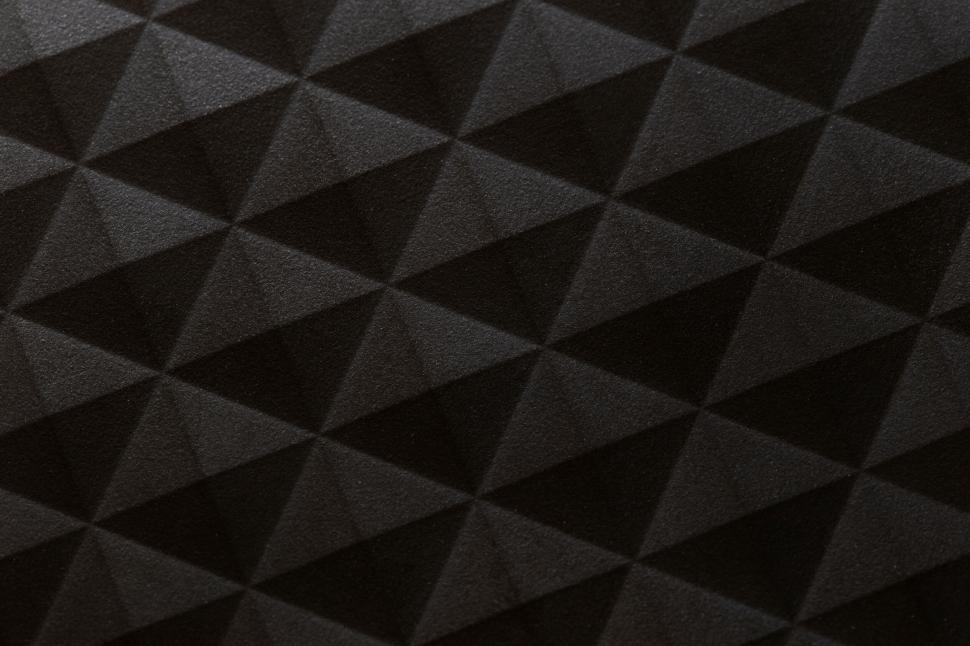 Free Image of Geometric black textured surface close-up 