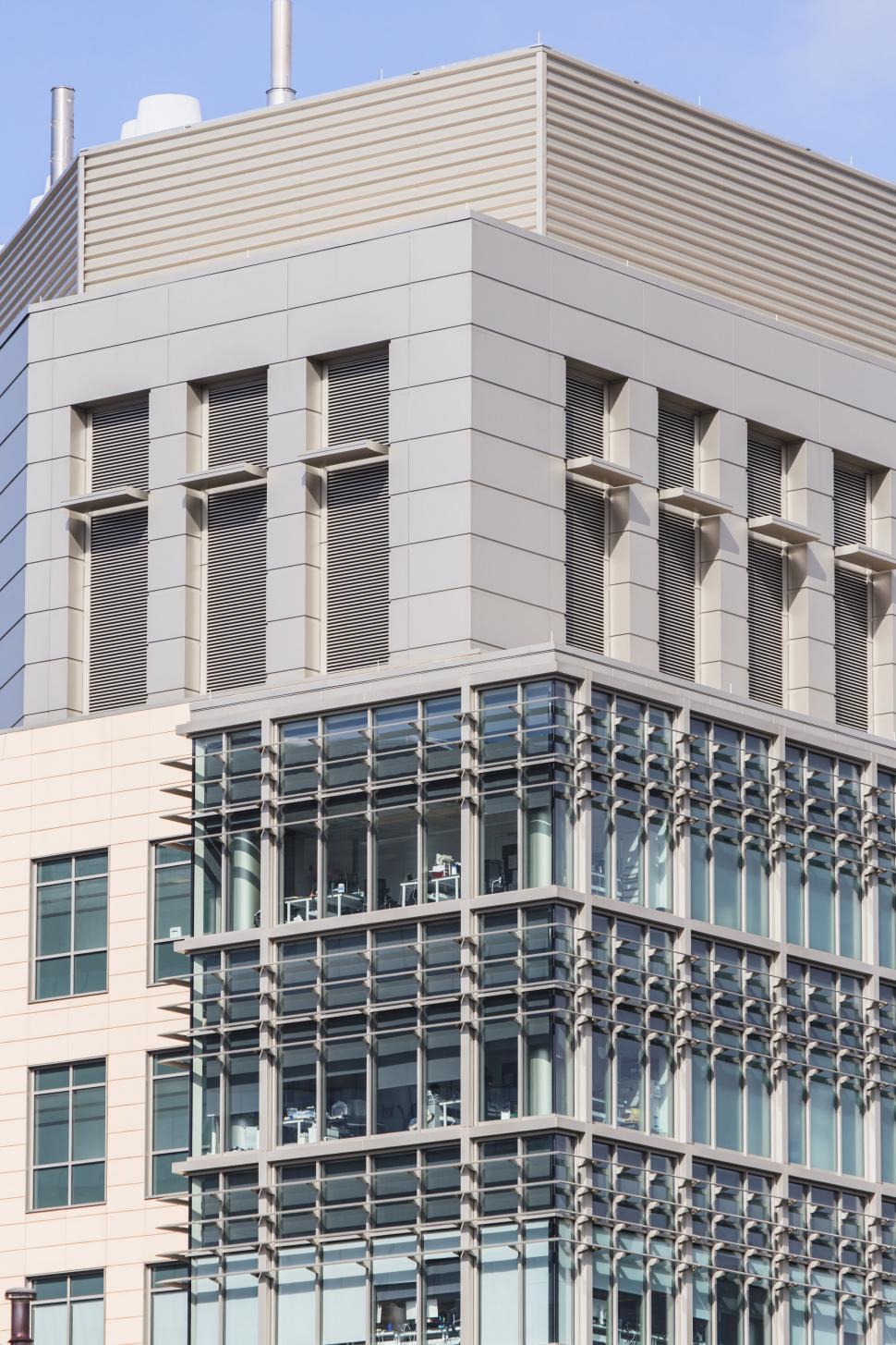 Free Image of Modern building with patterned facade and balconies 