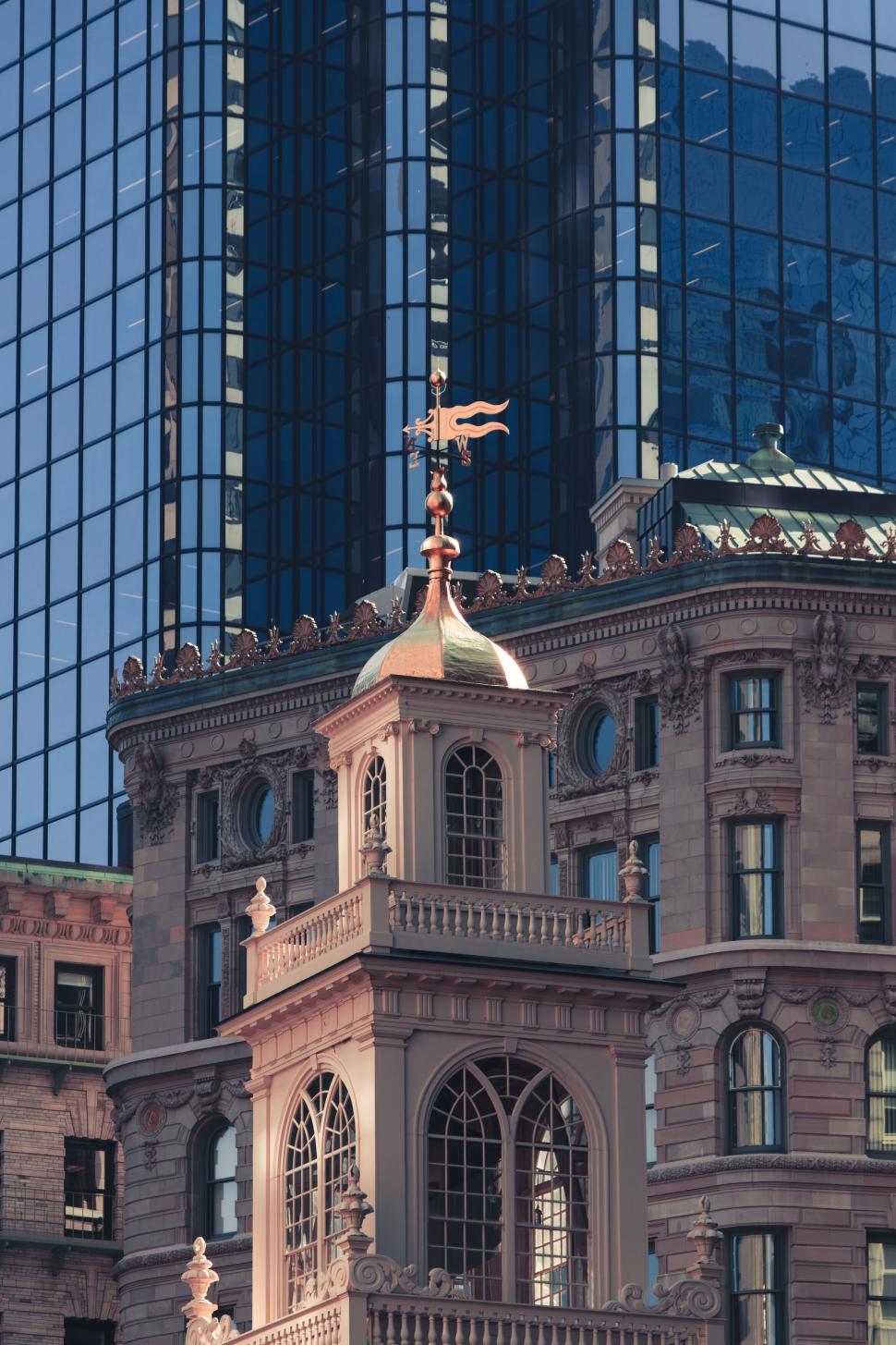 Free Image of Historical building amongst modern towers 