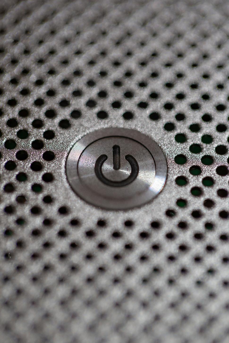 Free Image of Closeup of power button on high-tech surface 