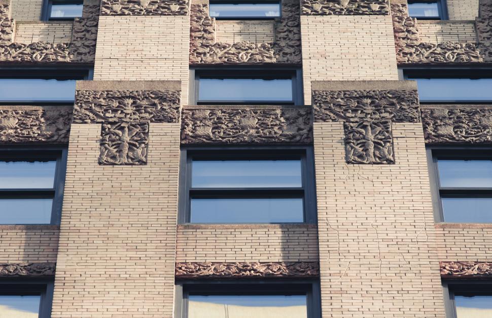 Free Image of Ornate facade of historic brick building 