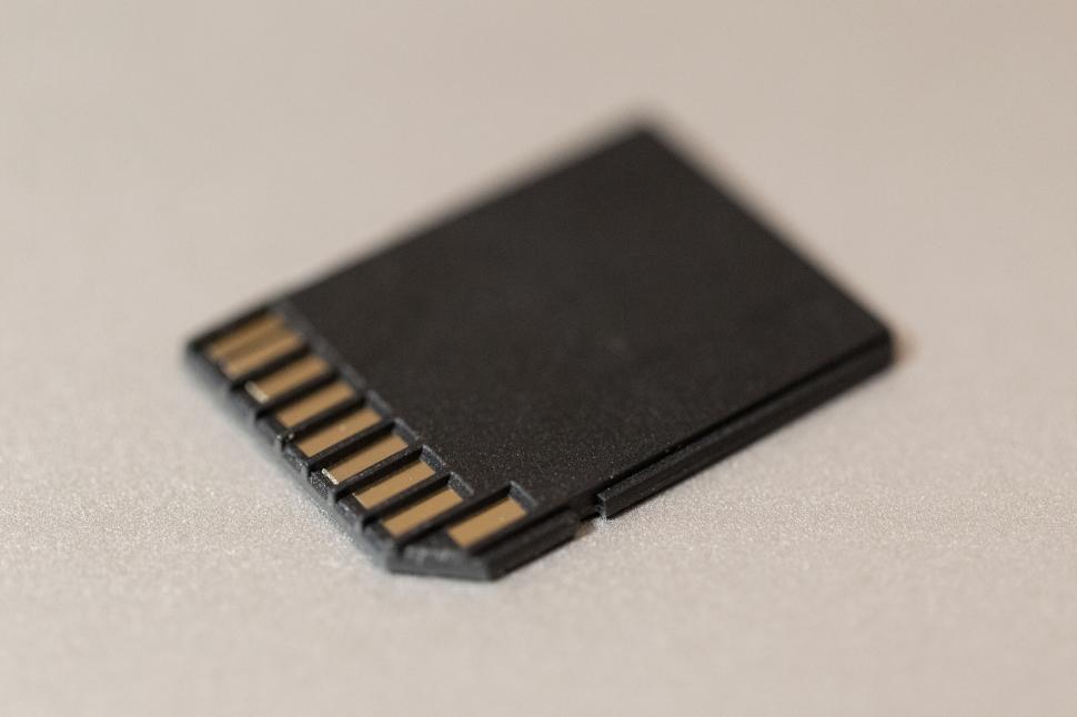 Free Image of Macro shot of a black SD card 