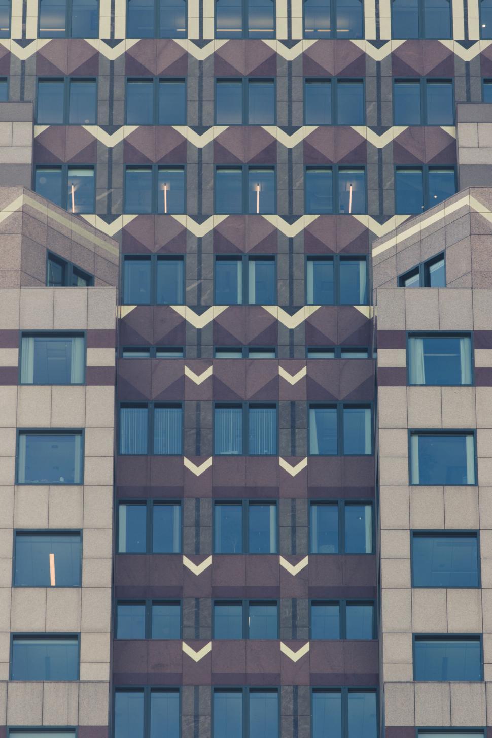 Free Image of Modern commercial building with patterned facade 