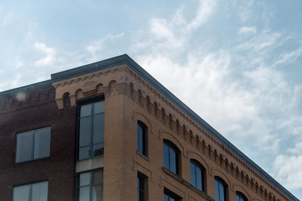 Free Image of Historic brick building corner against sky 