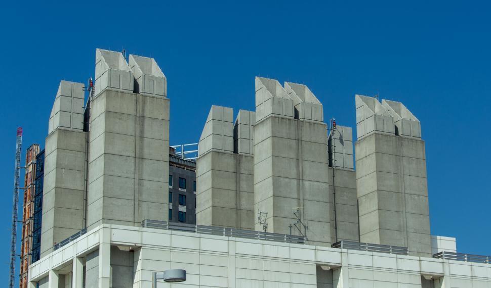 Free Image of Sculptural tops of concrete high-rise towers 