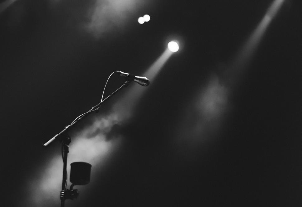 Free Image of Lonely microphone on empty stage 