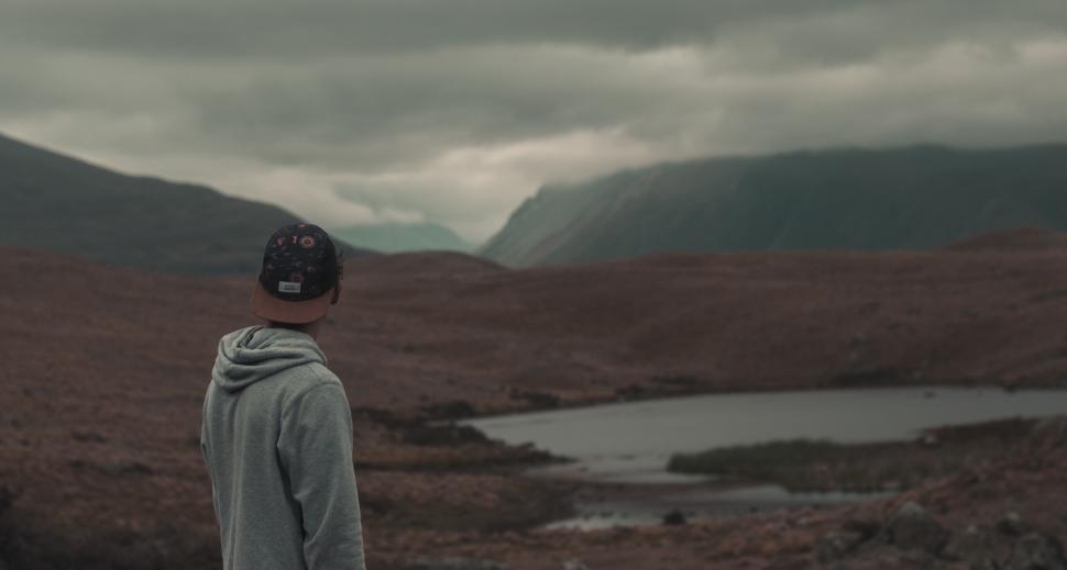 Free Image of Man gazing at mountainous landscape 