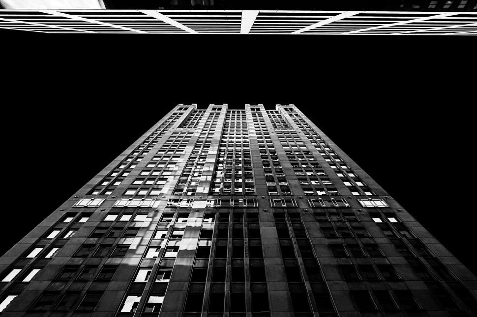 Free Image of Abstract view of a skyscraper with light trails 