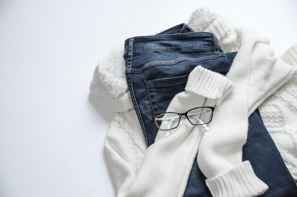 Free Image of Casual clothing and eyeglasses on white 