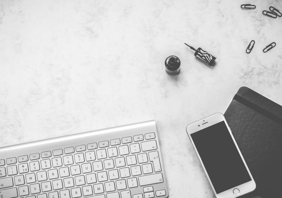 Free Image of Monochrome desk setup with tech gadgets 