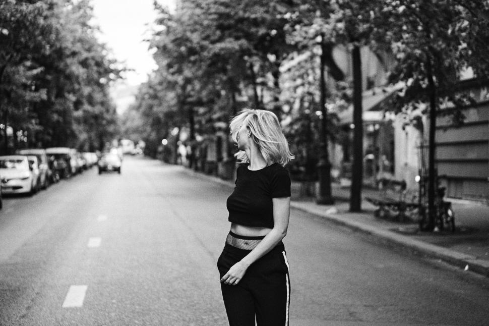 Free Image of Monochrome shot of woman on city road 