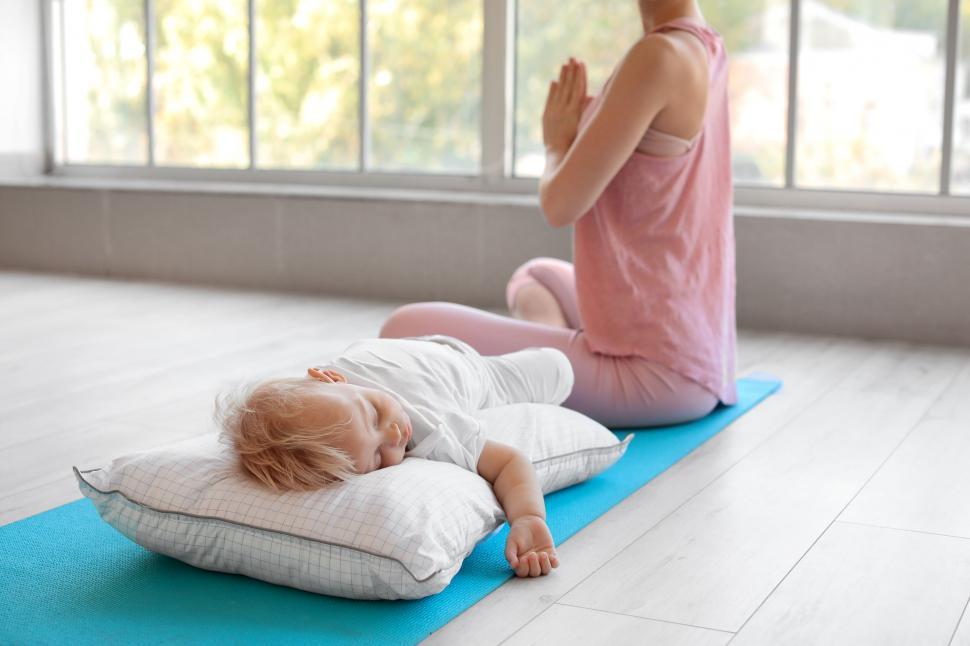 Free Image of Mother and child during a yoga session 
