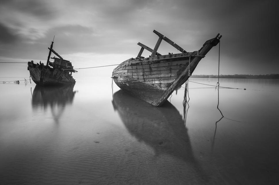 Free Image of Abandoned ships aground in shallow water 