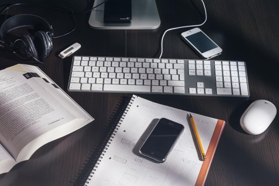 Free Image of Desk with electronics and study materials 