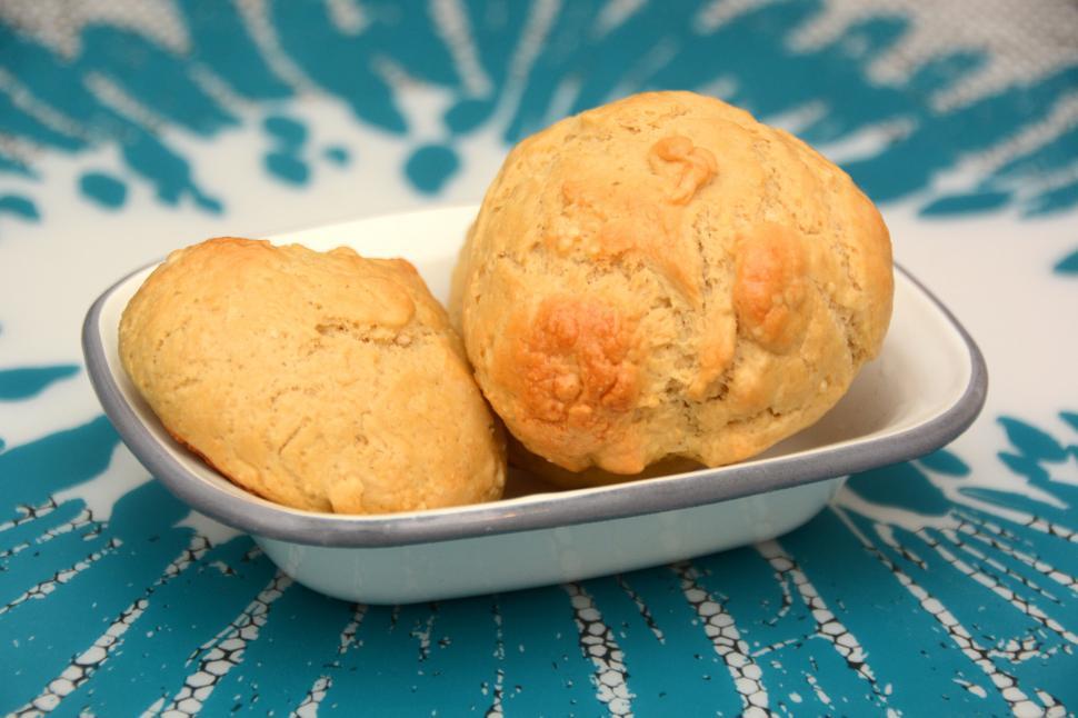 Free Image of Freshly baked cheese bread in a dish 