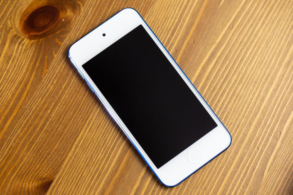 Free Image of Smartphone on a wooden surface 
