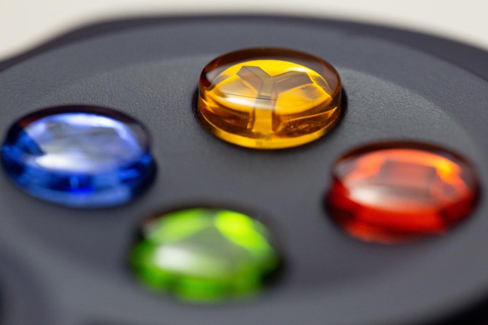Free Image of Colored gems on a black surface 