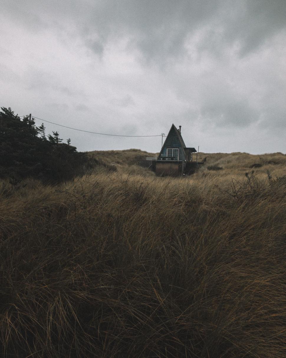 Free Image of Secluded house among windswept dunes 
