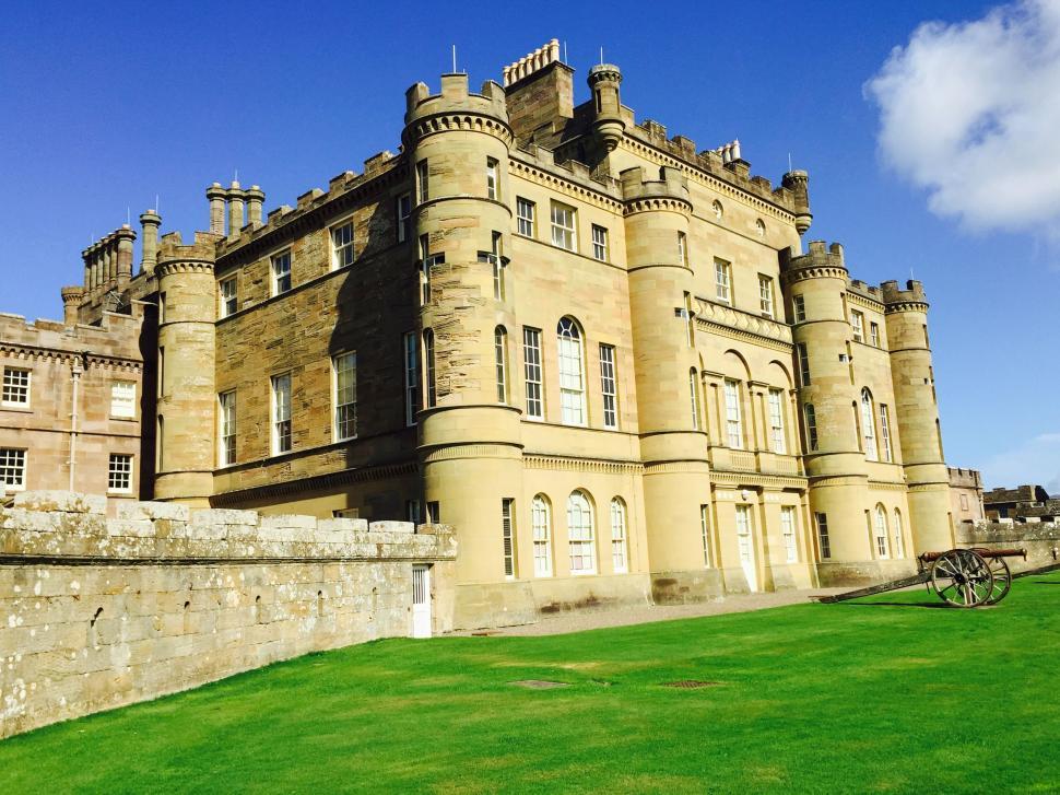 Free Image of Majestic castle under bright blue sky 