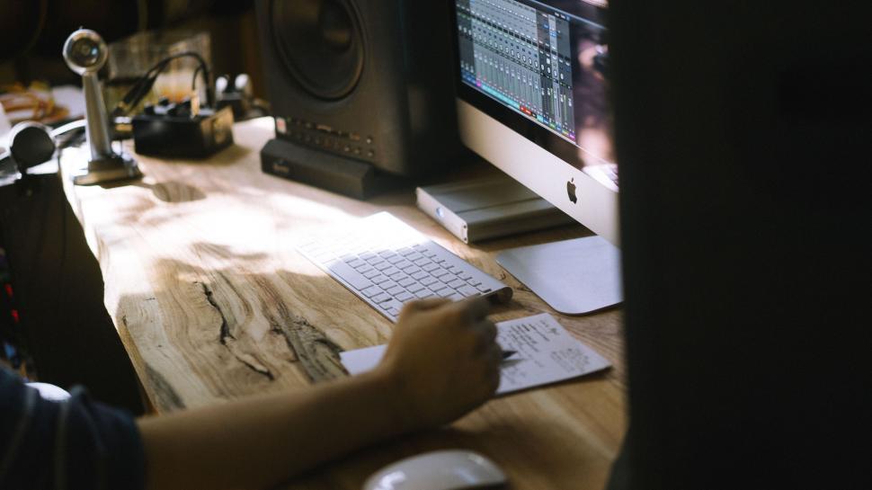 Free Image of Person working on a music project 