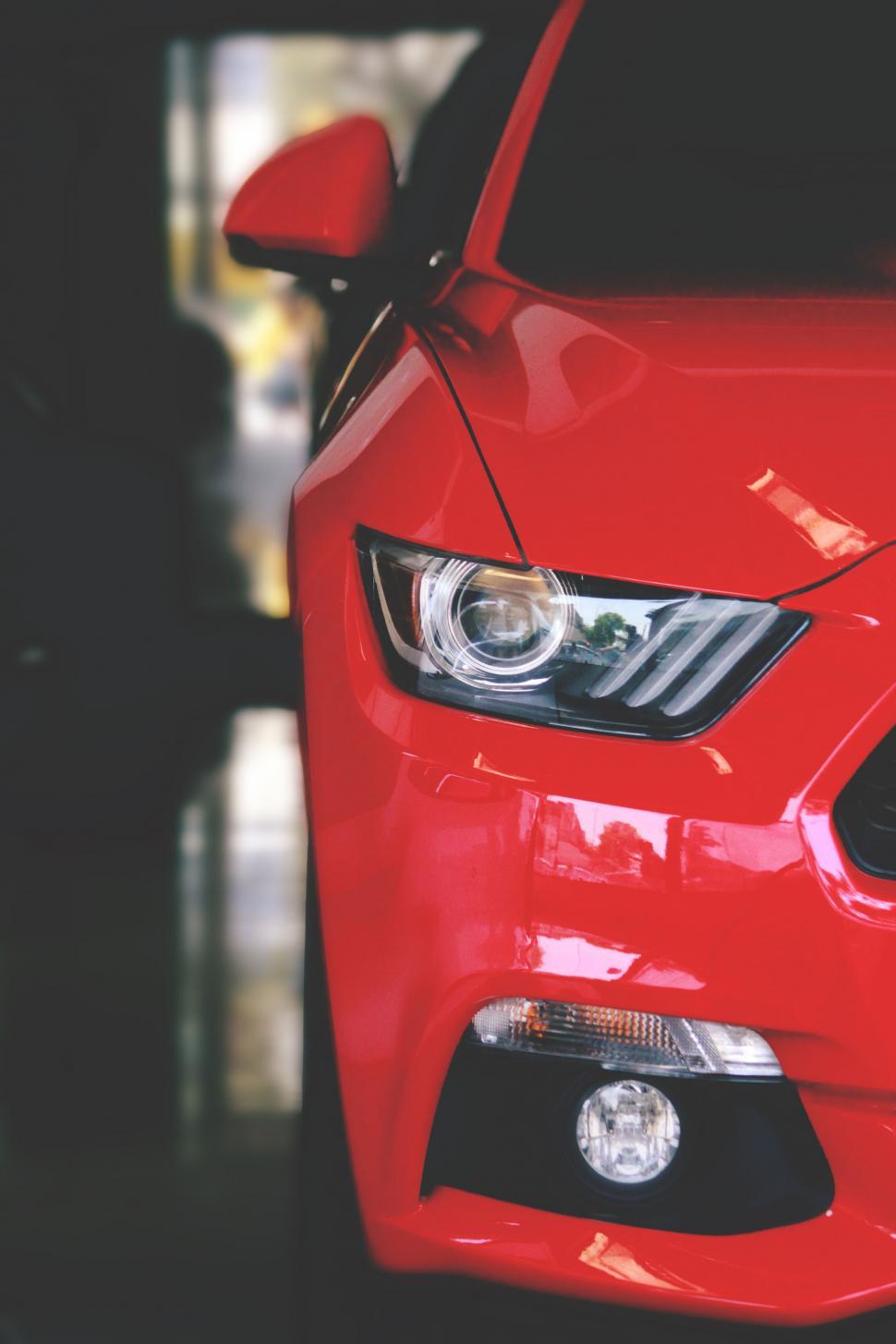 Free Image of Close-up of a red sports car s front 