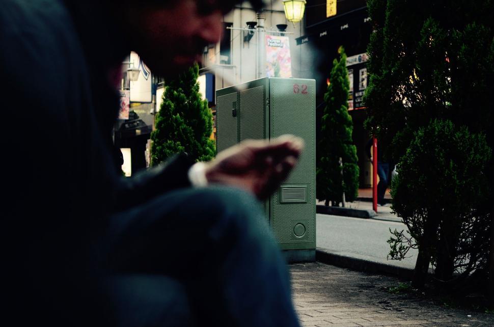 Free Image of Person in shadow on urban street 