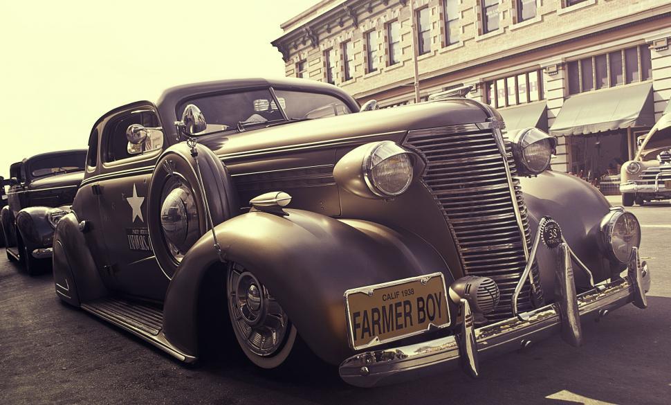 Free Image of Vintage car at a classic show with sepia tone 