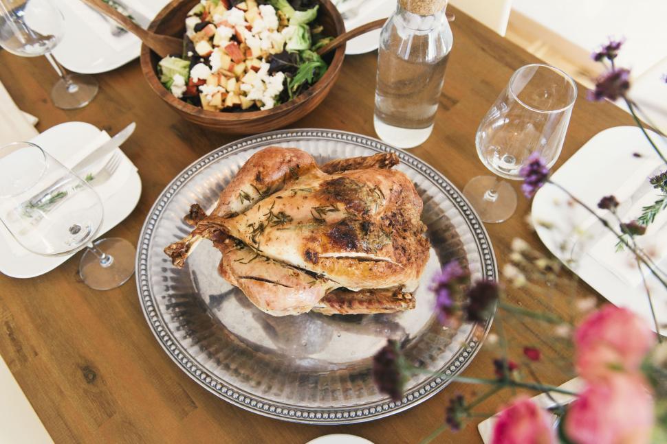 Free Image of Overhead view of roast chicken dinner table 