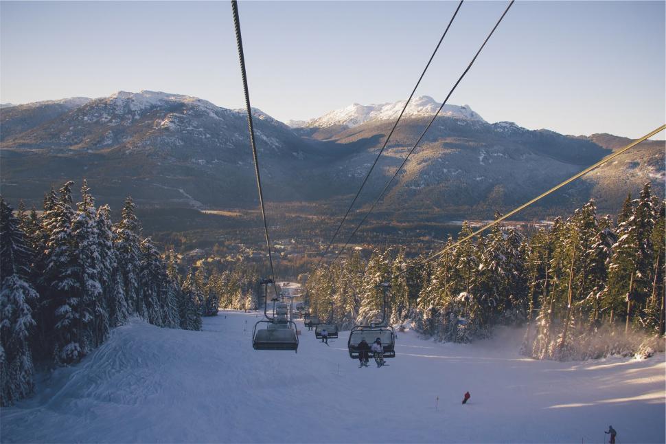 Free Image of Ski lift ride with scenic winter view 
