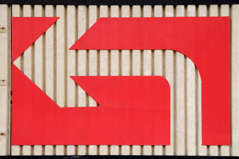 Free Image of Red arrow in negative space 