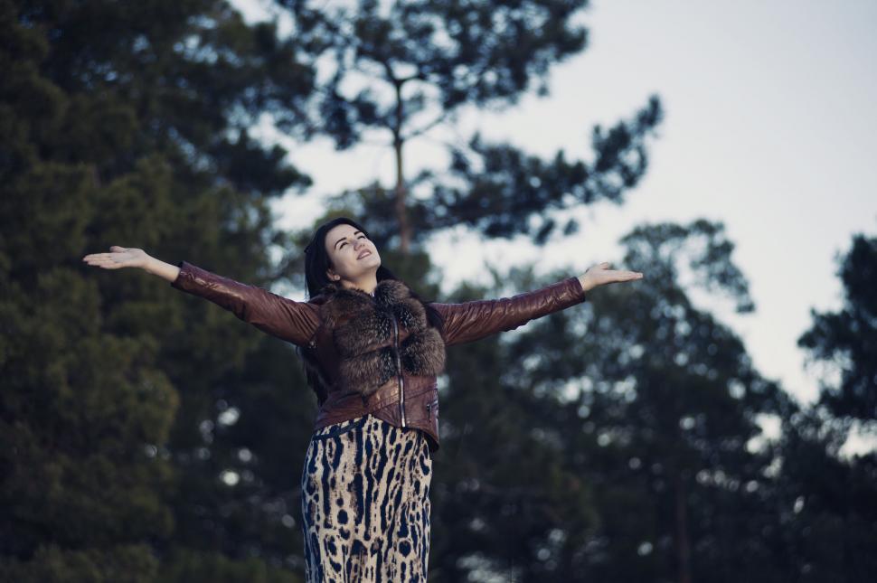 Free Image of Person embracing nature with open arms 